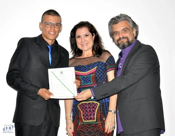 Casal Caia e Iscilla Piton na entrega de uma das homenagens do TG Casal Caia e Iscilla Piton na entrega de uma das homenagens do TG